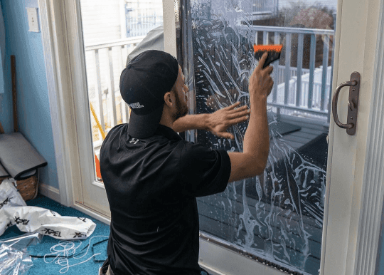 Commercial window tinting on a building by WildWrapz