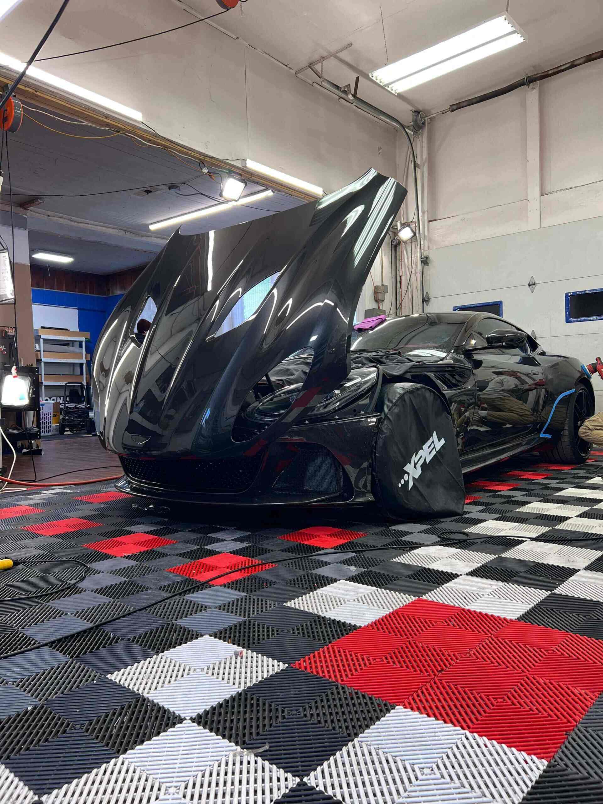 Vehicle protected with XPEL paint protection film by WildWrapz
